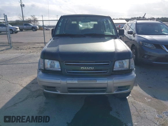 2000 Isuzu Trooper S z VIN JACDS58X9Y7J08094, wystawiony jako IAAI lot #41818546 z przebiegiem 154 927 mil mil oraz . Historia ofert i sprzedaży dostępna na DreamBid. Obrazek 6.