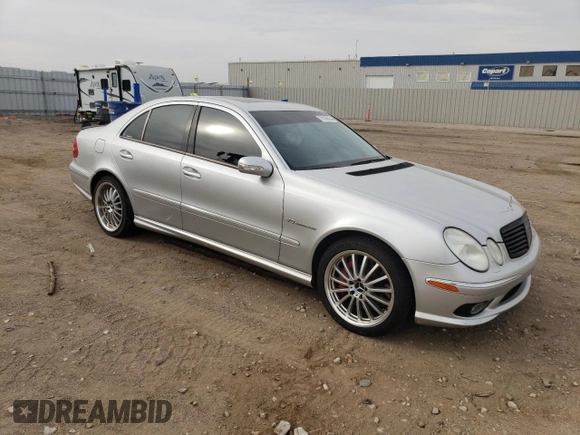 2005 Mercedes-Benz E-Class 5.5L AMG with VIN WDBUF76J05A730404, listed as a Copart auction lot 78168554 with 154,164 mi miles and Clean Title. Bid and sale history available at carsss.com. Image 4.