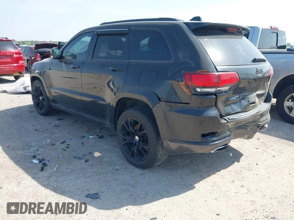 2015 Jeep Grand Cherokee Summit with VIN 1C4RJFJM1FC867861, listed as a IAAI auction lot 42034207 with 92,205 mi miles and . Bid and sale history available at DreamBid. Image 3.