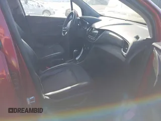 2018 Chevrolet Trax LT with VIN 3GNCJLSB5JL307086, listed as a IAAI auction lot 41941778 with 109,985 mi miles and . Bid and sale history available at carsss.com. Image 5.