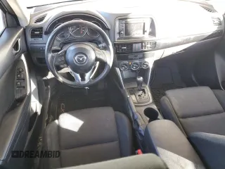 2014 Mazda CX-5 Sport with VIN JM3KE2BEXE0332590, listed as a Copart auction lot 87534365 with Not Provided miles and Salvage Title. Bid and sale history available at carsss.com. Image 8.