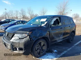 2021 Honda Passport Sport with VIN 5FNYF8H25MB030432, listed as a IAAI auction lot 41184469 with 44,315 mi miles and . Bid and sale history available at DreamBid. Image 6.