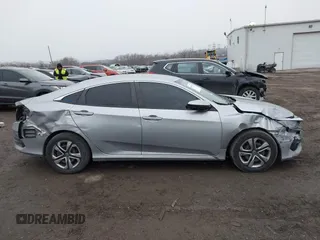 2018 Honda Civic LX with VIN 2HGFC2F56JH585343, listed as a IAAI auction lot 41558691 with 123,838 mi miles. Bid and sale history available at carsss.com. Image 14.