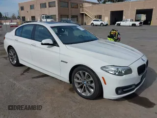 2015 BMW 5 Series 528i with VIN WBA5A5C52FD514437, listed as a IAAI auction lot 41755421 with 105,237 mi miles. Bid and sale history available at carsss.com. Image 1.