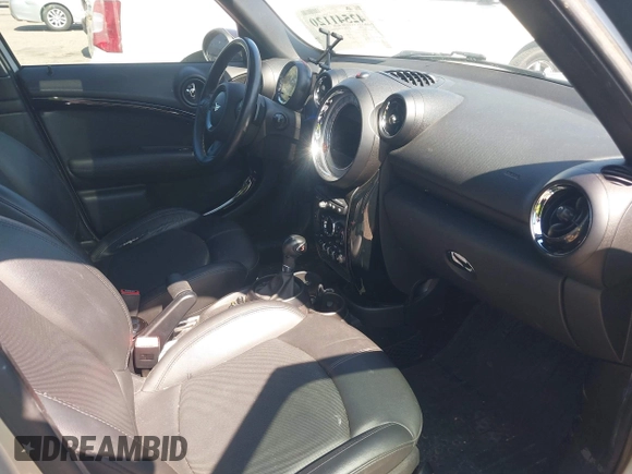 2014 MINI Countryman S with VIN WMWZC5C52EWP36667, listed as a IAAI auction lot 42541120 with 149,331 mi miles and . Bid and sale history available at DreamBid. Image 5.