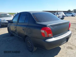 2002 Toyota ECHO with VIN JTDBT123120243848, listed as a IAAI auction lot 41677515 with 287,759 mi miles. Bid and sale history available at carsss.com. Image 3.