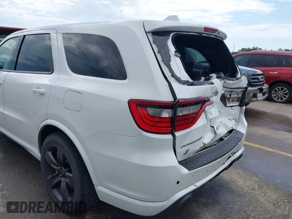 2018 Dodge Durango SRT z VIN 1C4SDJGJ3JC157474, wystawiony jako IAAI lot #42451967 z przebiegiem 150 667 mil mil oraz . Historia ofert i sprzedaży dostępna na DreamBid. Obrazek 18.