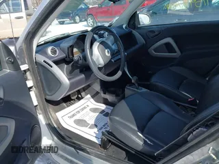 2015 Smart fortwo Passion z VIN WMEEJ3BA2FK790569, wystawiony jako IAAI lot #41598759 z przebiegiem 78 307 mil mil oraz . Historia ofert i sprzedaży dostępna na DreamBid. Obrazek 8.