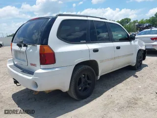 2007 GMC Envoy SLE with VIN 1GKDS13S872235926, listed as a IAAI auction lot 39701659 with 219,992 mi miles. Bid and sale history available at carsss.com. Image 4.