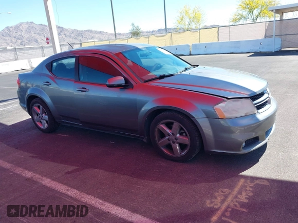 2013 Dodge Avenger SXT with VIN 1C3CDZCG3DN655815, listed as a IAAI auction lot 42190457 with 161,890 mi miles and . Bid and sale history available at carsss.com. Image 1.