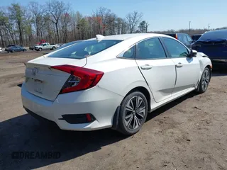 2017 Honda Civic Sedan EX-T with VIN 19XFC1F3XHE207572, listed as a IAAI auction lot 41935389 with 137,878 mi miles. Bid and sale history available at carsss.com. Image 4.