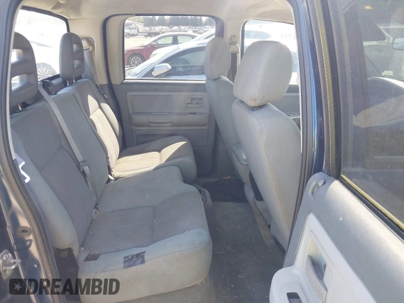 2006 Dodge Dakota SLT z VIN 1D7HW48NX6S708140, wystawiony jako IAAI lot #42054527 z przebiegiem 226 944 mil mil oraz . Historia ofert i sprzedaży dostępna na DreamBid. Obrazek 8.