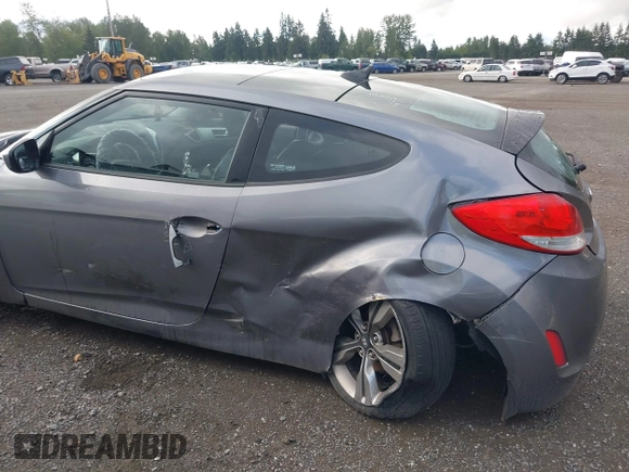 2012 Hyundai Veloster w/Gray Int z VIN KMHTC6AD9CU069416, wystawiony jako IAAI lot #42314080 z przebiegiem Nie podano mil oraz . Historia ofert i sprzedaży dostępna na DreamBid. Obrazek 6.