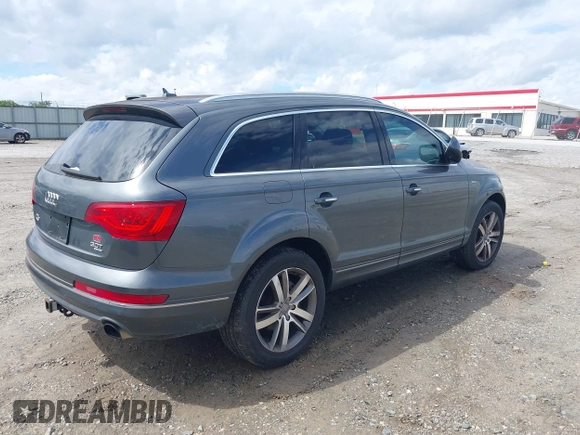 2015 Audi Q7 Premium Plus z VIN WA1LGAFE9FD014721, wystawiony jako IAAI lot #42403743 z przebiegiem 152 615 mil mil oraz . Historia ofert i sprzedaży dostępna na DreamBid. Obrazek 4.