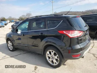 2013 Ford Escape SE with VIN 1FMCU0GX2DUB77759, listed as a Copart auction lot 42611795 with 165,485 mi miles and Salvage Title. Bid and sale history available at DreamBid. Image 2.