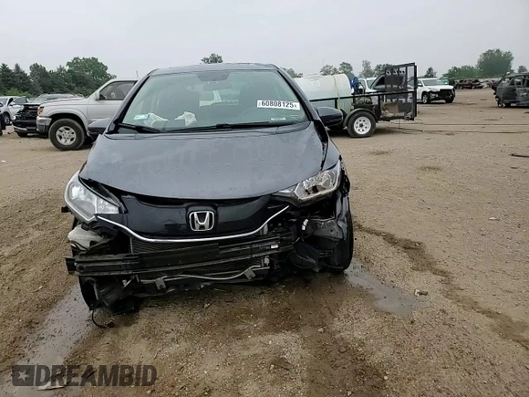 2015 Honda Fit EX-L z VIN 3HGGK5H85FM763929, wystawiony jako Copart lot #60808125 z przebiegiem 79 441 mil mil oraz Szkoda całkowita • Salvage title. Historia ofert i sprzedaży dostępna na DreamBid. Obrazek 14.