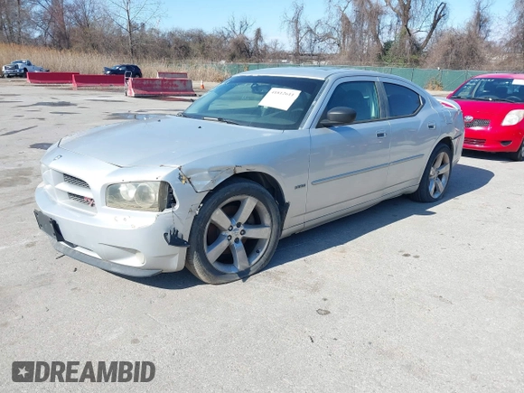 2009 Dodge Charger R/T with VIN 2B3LA53T89H610073, listed as a IAAI auction lot 41812611 with 135,364 mi miles. Bid and sale history available at carsss.com. Image 2.