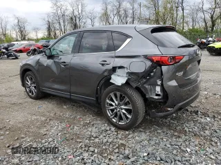 2019 Mazda CX-5 Signature with VIN JM3KFBEY3K0521581, listed as a Copart auction lot 53112925 with 62,977 mi miles and Salvage Title. Bid and sale history available at carsss.com. Image 2.