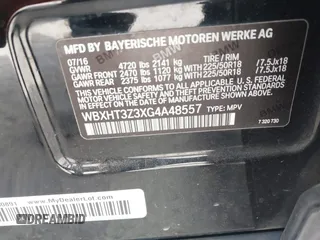 2016 BMW X1 xDrive28i with VIN WBXHT3Z3XG4A48557, listed as a IAAI auction lot 41387960 with 84,821 mi miles. Bid and sale history available at carsss.com. Image 9.
