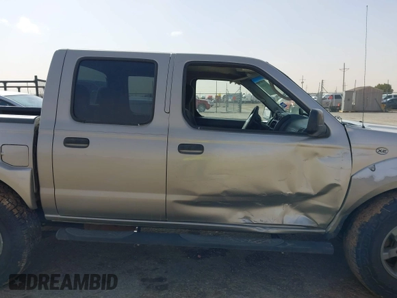 2004 Nissan Frontier XE z VIN 1N6ED27T54C427374, wystawiony jako IAAI lot #41712499 z przebiegiem 218 902 mil mil oraz . Historia ofert i sprzedaży dostępna na DreamBid. Obrazek 13.