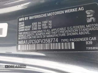 2015 BMW 2 Series M235i with VIN WBA1J7C50FV358774, listed as a IAAI auction lot 41559637 with 82,344 mi miles and . Bid and sale history available at carsss.com. Image 9.