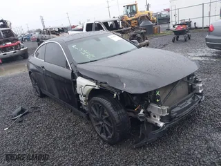 2015 BMW 4 Series 428i xDrive with VIN WBA3N5C56FK197981, listed as a IAAI auction lot 41145927 with 101,944 mi miles. Bid and sale history available at carsss.com. Image 1.