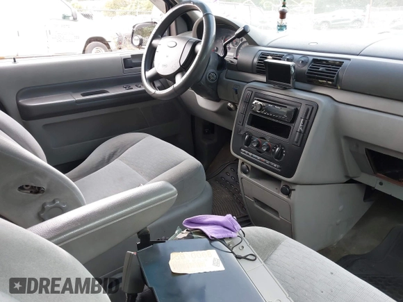 2005 Ford Freestar SE z VIN 2FMDA51645BA69323, wystawiony jako IAAI lot #40399931 z przebiegiem Nie podano mil oraz . Historia ofert i sprzedaży dostępna na DreamBid. Obrazek 5.