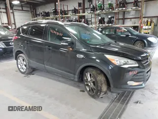 2015 Ford Escape Titanium z VIN 1FMCU0JX9FUB48089, wystawiony jako IAAI lot #41048127 z przebiegiem 133 439 mil mil oraz . Historia ofert i sprzedaży dostępna na DreamBid. Obrazek 1.