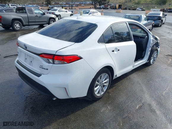 2024 Toyota Corolla Hybrid LE with VIN JTDBCMFE2R3061338, listed as a IAAI auction lot 41692872 with 21,783 mi miles. Bid and sale history available at carsss.com. Image 4.