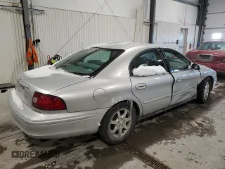 2000 Mercury Sable GS with VIN 1MEFM50U5YG601095, listed as a Copart auction lot 46221875 with 125,321 mi miles and Salvage title. Bid and sale history available at DreamBid. Image 3.