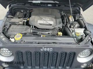 2018 Jeep Wrangler Unlimited Sahara with VIN 1C4BJWEG7JL856331, listed as a Copart auction lot 50246135 with 101,014 mi miles and Salvage title. Bid and sale history available at DreamBid. Image 12.