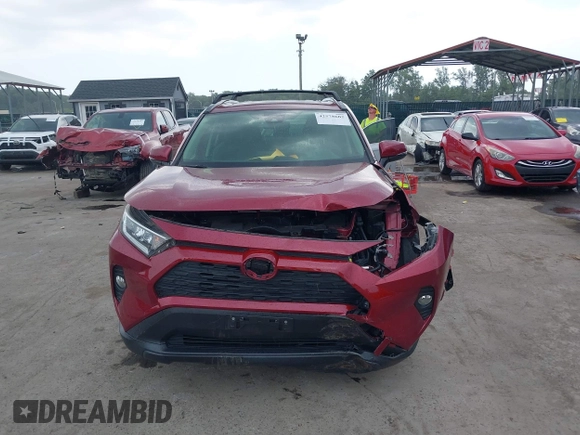 2019 Toyota RAV4 XLE with VIN JTMP1RFV6KD506382, listed as a IAAI auction lot 42578602 with 46,223 mi miles and . Bid and sale history available at DreamBid. Image 12.