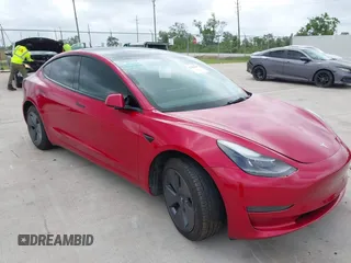 2023 Tesla Model 3 with VIN 5YJ3E1EA0PF455058, listed as a IAAI auction lot 42201618 with 31,147 mi miles and . Bid and sale history available at DreamBid. Image 1.