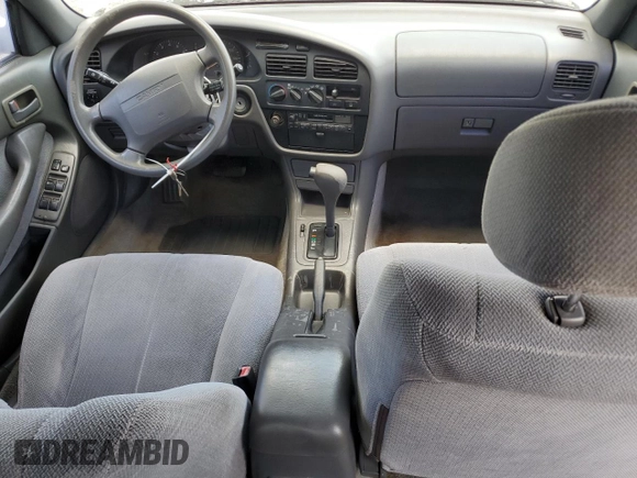 1995 Toyota Camry LE with VIN 4T1SK12E4SU878765, listed as a Copart auction lot 57761385 with 181,674 mi miles and Clean title. Bid and sale history available at DreamBid. Image 8.