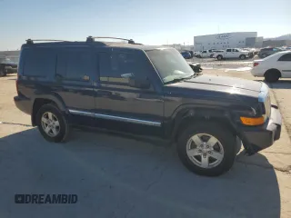 2006 Jeep Commander with VIN 1J8HH48K06C179567, listed as a Copart auction lot 88556105 with 196,696 mi miles and Salvage title. Bid and sale history available at DreamBid. Image 4.