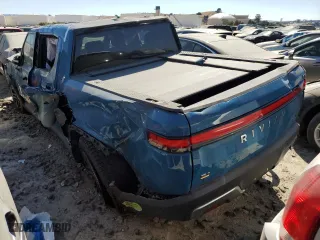 2022 Rivian R1T Adventure Package with VIN 7FCTGAAA4NN010881, listed as a Copart auction lot 58783584 with 0 mi miles and Salvage Title. Bid and sale history available at carsss.com. Image 2.