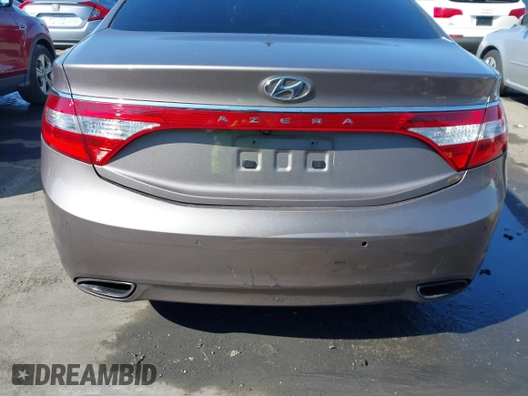 2013 Hyundai Azera with VIN KMHFH4JG2DA256481, listed as a IAAI auction lot 41673405 with 180,130 mi miles and . Bid and sale history available at DreamBid. Image 6.