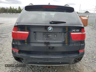 2012 BMW X5 35i z VIN 5UXZV4C5XCL752071, wystawiony jako Copart lot #56623145 z przebiegiem 180 161 mil mil oraz Czysty tytuł • Clean title. Historia ofert i sprzedaży dostępna na DreamBid. Obrazek 6.