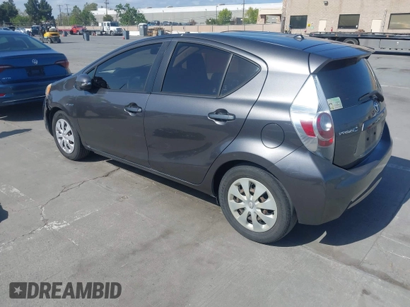 2014 Toyota Prius One with VIN JTDKDTB33E1061088, listed as a IAAI auction lot 42040762 with 206,735 mi miles and . Bid and sale history available at DreamBid. Image 3.