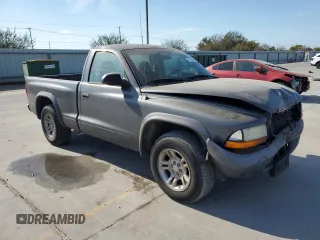2003 Dodge Dakota with VIN 1D7FL16X13S189963, listed as a Copart auction lot 77114344 with 100,127 mi miles and Salvage Title. Bid and sale history available at carsss.com. Image 4.
