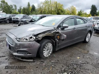 2014 Ford Fusion SE Hybrid with VIN 3FA6P0LU3ER357934, listed as a Copart auction lot 73479023 with 154,412 mi miles and Salvage title. Bid and sale history available at DreamBid. Image 1.