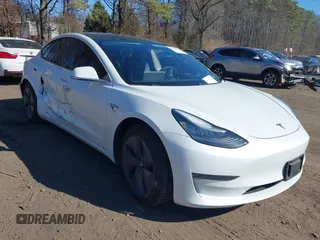 2020 Tesla Model 3 Standard Range Plus with VIN 5YJ3E1EA0LF783672, listed as a IAAI auction lot 41903431 with 52,157 mi miles and . Bid and sale history available at carsss.com. Image 1.