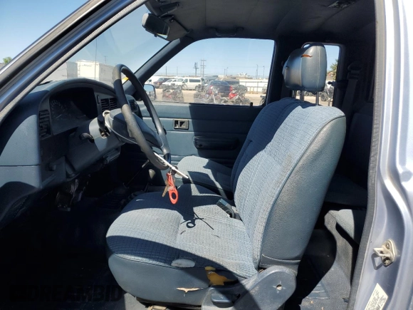 1991 Toyota Pickup z VIN JT4RN13PXM6031833, wystawiony jako Copart lot #58953095 z przebiegiem 252 237 mil mil oraz Czysty tytuł • Clean title. Historia ofert i sprzedaży dostępna na DreamBid. Obrazek 7.