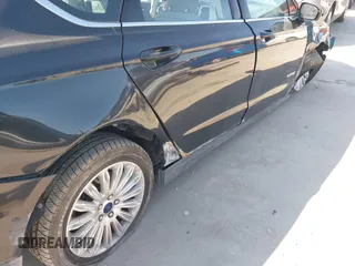 2015 Ford Fusion S Hybrid with VIN 3FA6P0UU9FR106402, listed as a IAAI auction lot 41983961 with 27,122 mi miles. Bid and sale history available at carsss.com. Image 12.