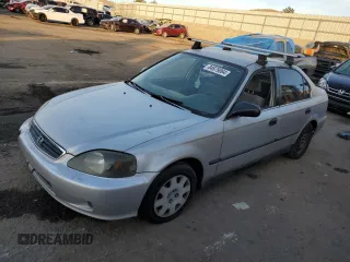 1999 Honda Civic LX z VIN JHMEJ6673XS001134, wystawiony jako Copart lot #42090765 z przebiegiem 265 318 mil mil oraz Szkoda całkowita • Salvage title. Historia ofert i sprzedaży dostępna na DreamBid. Obrazek 1.