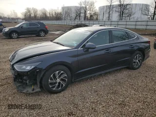2022 Hyundai Sonata Hybrid Blue with VIN KMHL24JJ6NA048279, listed as a Copart auction lot 49585045 with 59,419 mi miles and Salvage Title. Bid and sale history available at carsss.com. Image 1.