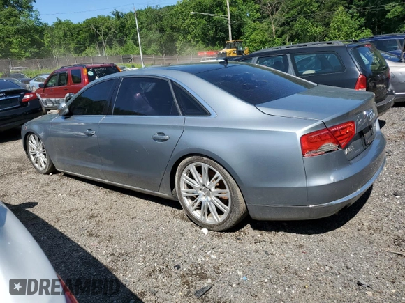 2012 Audi A8 z VIN WAURVAFDXCN001167, wystawiony jako Copart lot #57227105 z przebiegiem 154 409 mil mil oraz Szkoda całkowita • Salvage title. Historia ofert i sprzedaży dostępna na DreamBid. Obrazek 2.