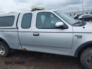 2002 Ford F-150 XL с VIN 1FTRX18L52NB18963, выставлен на аукционе IAAI как лот 42042014 с пробегом 229 262 миль миль и . История ставок и продаж доступна на DreamBid. Изображение 13.