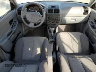 2003 Hyundai Accent GL with VIN KMHCG45C13U429952, listed as a Copart auction lot 77835874 with 120,554 mi miles and Salvage Title. Bid and sale history available at carsss.com. Image 8.