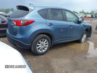 2016 Mazda CX-5 Touring z VIN JM3KE2CY3G0728968, wystawiony jako IAAI lot #42189174 z przebiegiem 145 977 mil mil oraz . Historia ofert i sprzedaży dostępna na DreamBid. Obrazek 4.